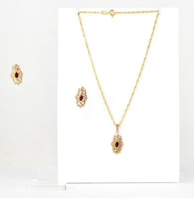 Lot 914 - A pair of 9ct yellow gold earring stud...