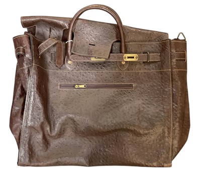 Lot 563 - A brown ostrich skin handbag, 58 x 48cm.