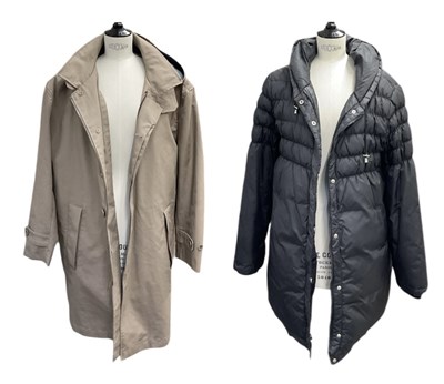 Lot 572 - DKNY; a brown hooded coat and black puffer...