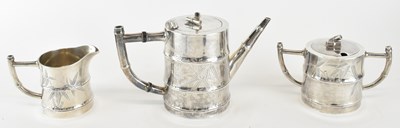 Lot 1034 - A Continental white metal three piece tea...