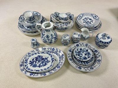 Lot 150 - MEISSEN; a group of blue and white ceramics,...