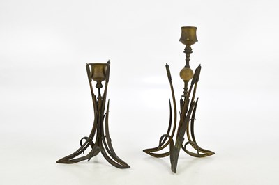 Lot 2399 - A pair of Aesthetic Movement gilt metal candle...