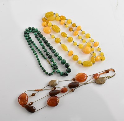 Lot 426 - A vintage graduated malachite bead necklace,...