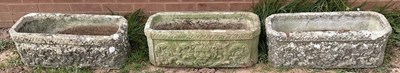 Lot 671 - Three composite stone garden troughs, 26 x 70...