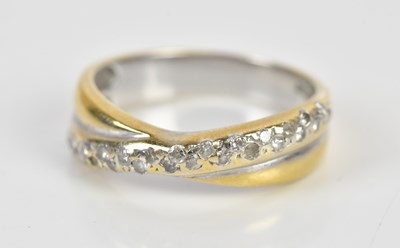 Lot 107 - An 18ct white and yellow gold diamond set...