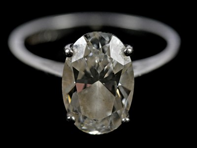 Lot 313 - An 18ct white gold 3ct oval brilliant cut...