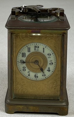 Lot 649 - A 19th century brass carriage clock, with gilt...