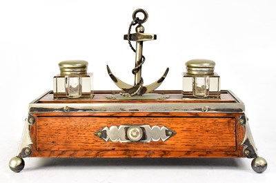 Lot 229 - MARITIME INTEREST; an early 20th century oak...
