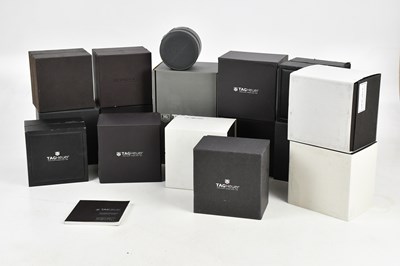 Lot 601 - TAG HEUER; fourteen empty wristwatch boxes and...