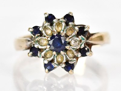Lot 782 - A 9ct yellow gold floral cluster ring set with...