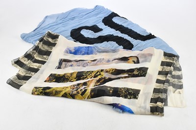 Lot 704 - MOSCHINO; a 100% silk rectangular scarf from...