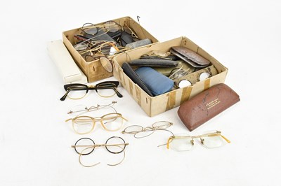 Lot 1345 - A collection of vintage spectacles to include...