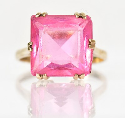 Lot 777 - A 9ct yellow gold ring set with a large square...
