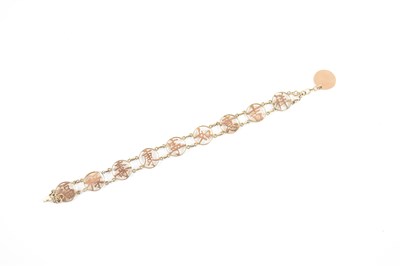 Lot 255 - A Chinese yellow metal bracelet, with nine...
