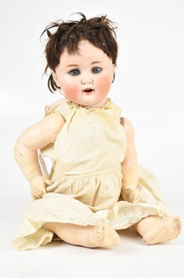 Lot 626 - A 19th century bisque headed doll, 46cm.