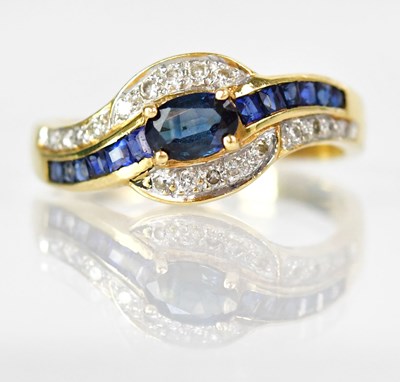 Lot 765 - An 18ct yellow gold ring set with an oval...