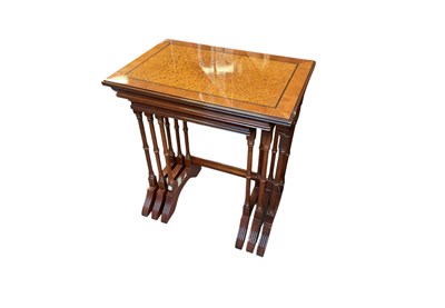Lot 2113 - A reproduction nest of three burr yew effect...