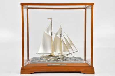 Lot 1514 - TAKEHIKO; a sterling silver model of a yacht,...