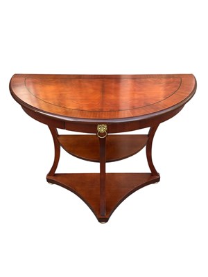 Lot 2098 - A reproduction demi-lune single drawer console...