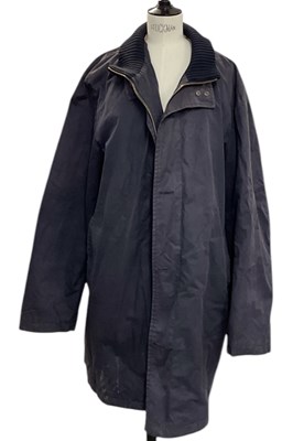 Lot 575 - BURBERRY; a navy gentleman's raincoat, with...