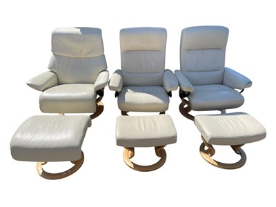 Lot 2282 - STRESSLESS; three cream upholstered easy...