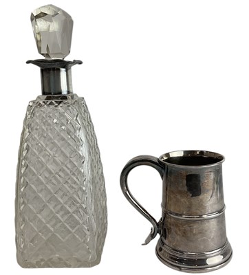 Lot 1106 - A large press moulded glass decanter, with...