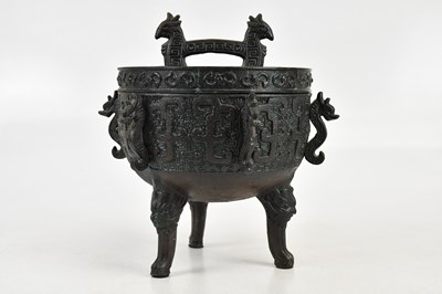 Lot 98 - A modern Chinese bronzed metal censer, height...