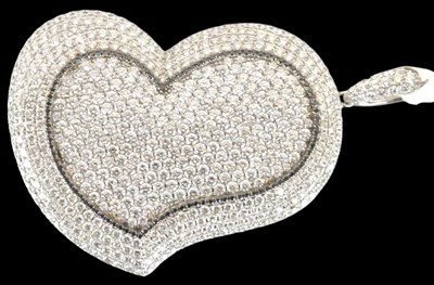 Lot 1373 - An 18ct white gold diamond set heart shaped...