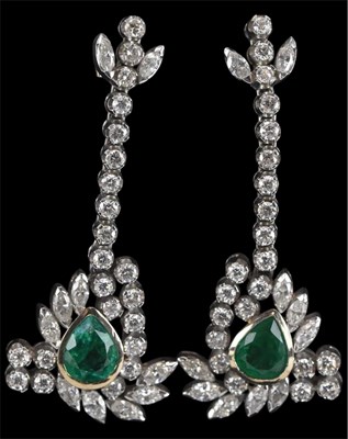 Lot 1477 - An impressive pair of white metal emerald and...