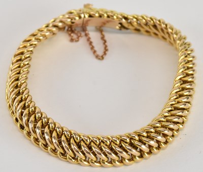 Lot 1577 - A 15ct gold snake link bracelet, with box...