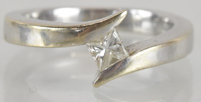 Lot 1238 - An 18ct white gold diamond set ring, the...