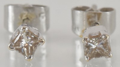 Lot 1490 - A pair of 9ct gold square diamond stud...