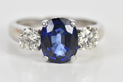 Lot 36 - An 18ct white gold diamond and sapphire set...