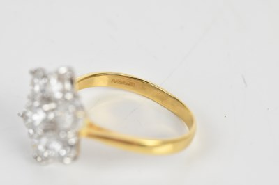Lot 38 - An 18ct yellow gold diamond seven stone daisy...