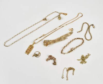 Lot 485 - An Egyptian yellow metal pendant, suspended on...