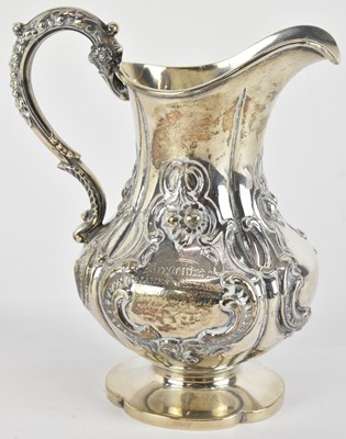 Lot 1164 - A Victorian hallmarked silver milk jug in the...