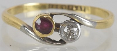Lot 1315 - An 18ct gold ring, with bezel set small...
