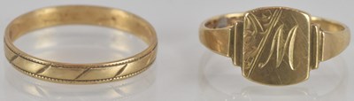 Lot 1364 - A 9ct gold signet ring, with diagonal floral...