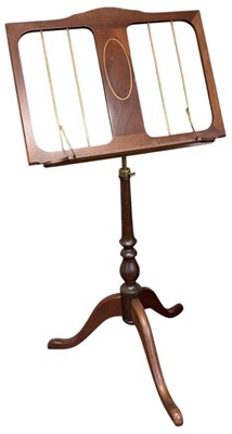 Lot 78 - A brass and mahogany music stand, with...