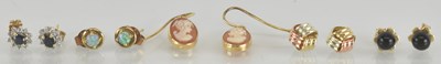Lot 1502 - Five pairs of gold and other stud earrings,...