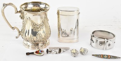 Lot 1174 - A group of seven small silver items comprising...