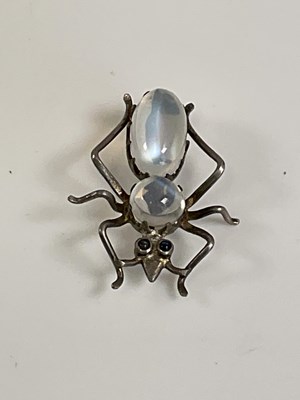 Lot 594 - A vintage white metal moonstone and sapphire...