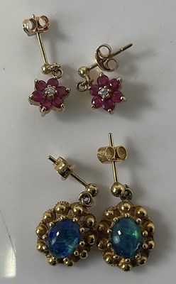 Lot 409 - A pair of 9ct yellow gold flower head drop...