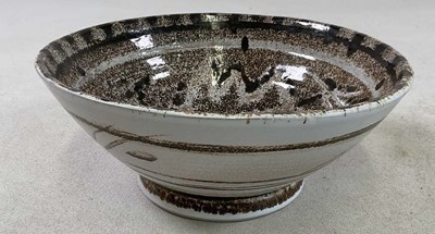 Lot 198 - A studio pottery bowl with stylised bird...