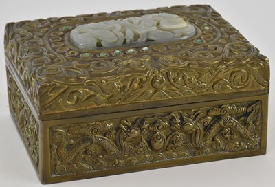 Lot 583 - A late 19th century Chinese embossed brass...