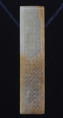 Lot 584 - A Chinese jade archaic belt hook, with russet...