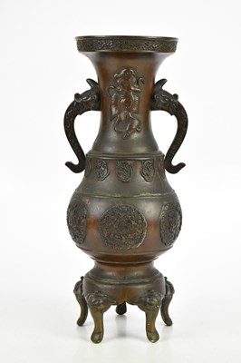 Lot 18 - A Japanese Meiji style bronze twin handled...