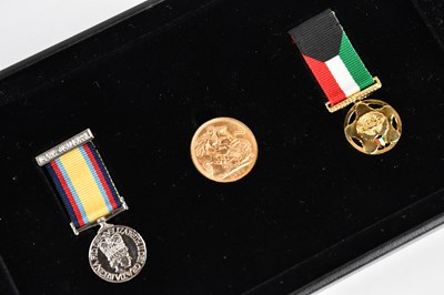 Lot 2498 - ROYAL MINT; a boxed coin/medal set, 'Behind...