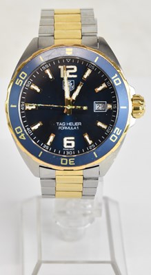 Lot 1774 - TAG HEUER; a gentleman's gold plated and...