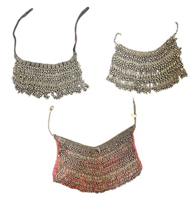 Lot 776 - Three Middle Eastern Bedouin white metal...